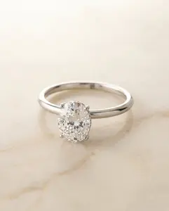 The Eartha Hidden Halo Solitaire Engagement Ring Setting for Oval Diamonds in 18K White Gold