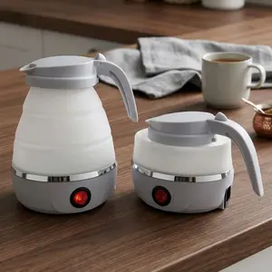 UpdateClassic 0.6L Portable Foldable Electric Kettle Compact Travel Hot Water Boiler for Coffee Tea White Lightweight & Practical - Mug