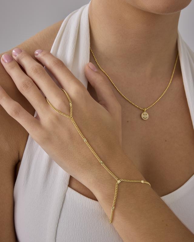 PAVOI 14K Gold Plated Hand Chains for Women - Dainty Cubic Zirconia Bracelet and Ring Handchain Jewelry - Lightweight Trendy Hand Chain Bracelet