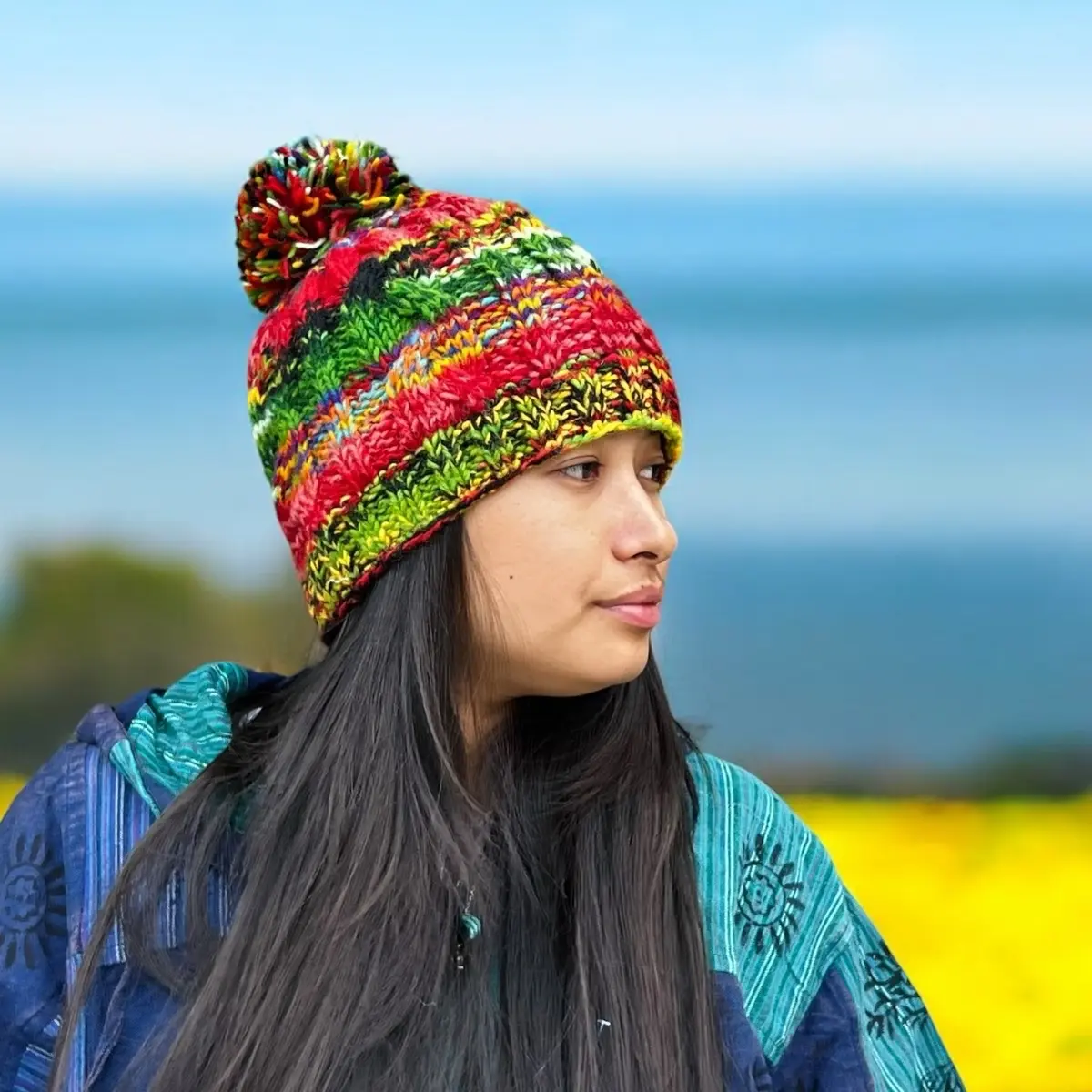 Hand Knit Beanie| wool Beanie Handmade and made in Nepal Pom poms | Colorful, Cozy, Warm and comfortable- Boho style winter one size Hat.