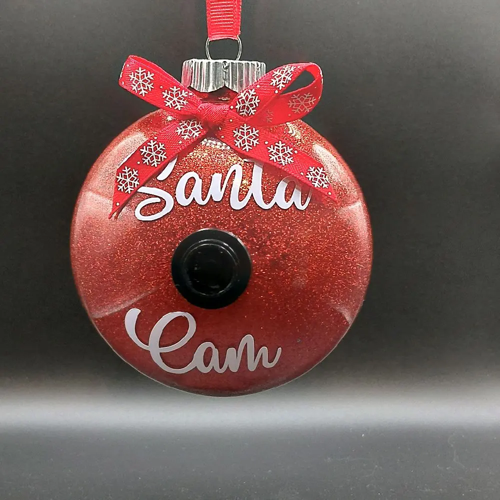 Santa Cam Ornament - Red Glitter Christmas Decoration with Snowflake Ribbon and Camera Design