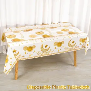 One Piece of a White And Golden Disposable Plastic Tablecloth for Ramadan, Measuring , Featuring a Design with Moons, Lanterns, And Stars. This Black Table Cover Is Machine-Made And Suitable for Islamic Muslim Celebrations During for ei