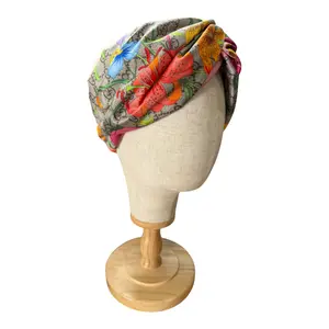 Pre-owned Gucci GG Flora Silk Turban Headband Supreme Monogram Flora print.