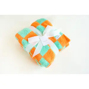 Teal and Orange Checkered Blanket