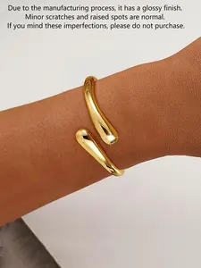 1 fashionable and simple teardrop gold bracelet. The thick teardrop design of the cuff gold bracelet jewelry is a gift for women.