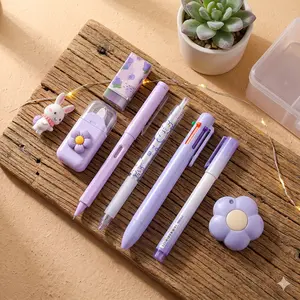 7-Piece Purple Stationery Set: Includes a Transparent Pencil Case, Ballpoint Pen, Pencil Sharpener, Highlighter, Correction Tape, Ruler, and Utility Knife—Ideal for Office and School Use.