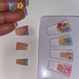 HELLO KITTY BEJEWELED DESIGNED PRESS ON NAIL SET with Star and Bow Accents for Stylish Manicures