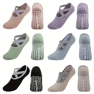 12 Pairs yoga socks featuring anti slip adhesive dots and cross strap construction for superior stability designed for Pilates ballet and pole fitness secure grip ideal for various dance studio activities