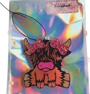 Highland Cow Freshie Care Bombshell Scented Car Air Freshener with Glitter Bow Accents and Unique Cow Design
