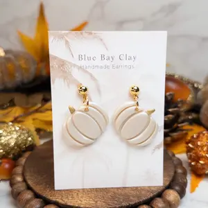 Blue Bay Clay Handmade White Shimmer Pumpkin Dangle Earrings Handcrafted Clay Fall Jewelry for Autumn Enthusiasts Hypoallergenic Nickel-Free Comfortable Safe Wear