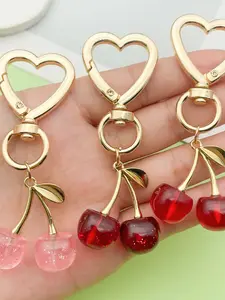 A fashionable and cute cherry pendant, bag pendant, Fashionable Charms, suitable for daily wear, and also a surprising and exquisite small gift.