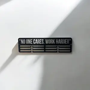 “No one cares. Work Harder” metal hanger “No one cares. Work Harder” metal hanger