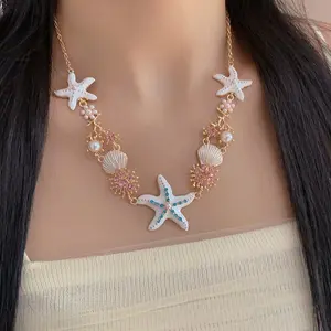 A gorgeous starfish pendant necklace and bracelet with shell details and sea coral beads, suitable for daily beach wear and ocean vacation style