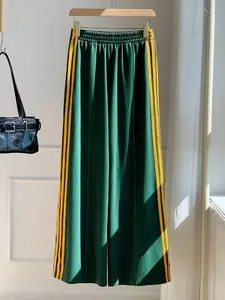 A fashionable women's side yellow striped drawstring wide leg pants with a relaxed and energetic look, suitable for daily commuting, casual outings, light social gatherings, and spring/summer vacations