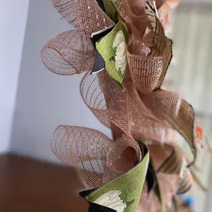 Fall inspired pancake shaped wreath green cream blue pink black white