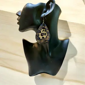 Handcrafted Upcycled denim earrings.