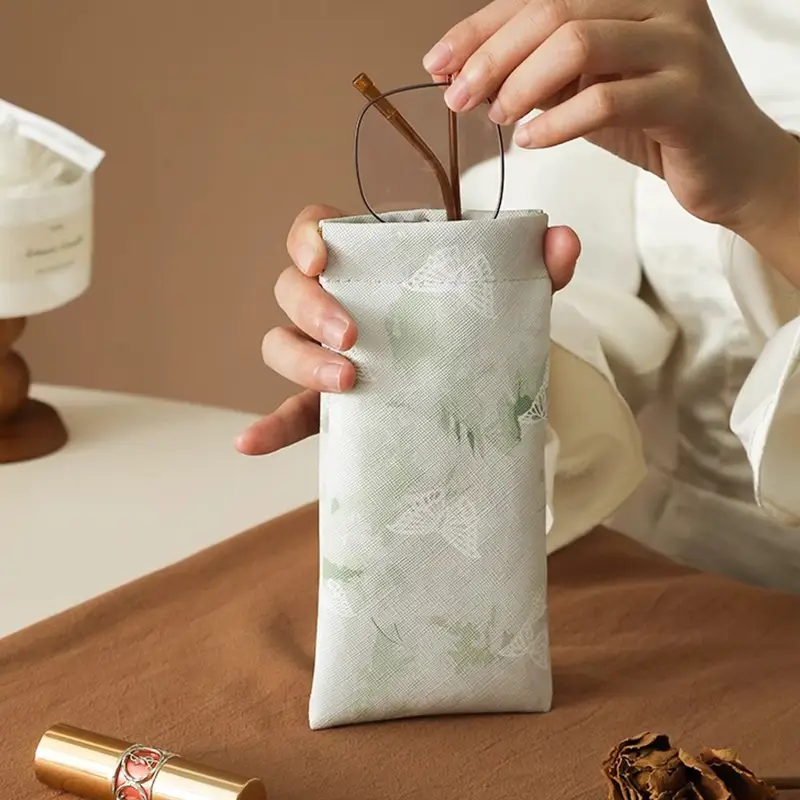 A modern-style snap pouch for storing lipstick, keys, makeup, coins, or charging cables.