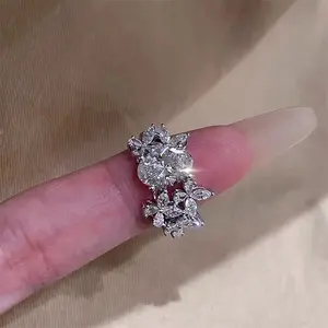 Light luxury floral Moissanite ring—ultra-sparkling fully set design that recreates the dazzling brilliance of a diamond ring. The main stone paired with horseshoe-shaped accent stones makes your hand look exceptionally slim when worn. Made from high-qual