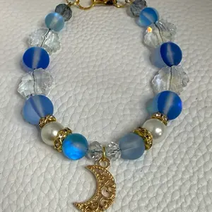 Handmade moon charm  blue and clear bead bracelet
