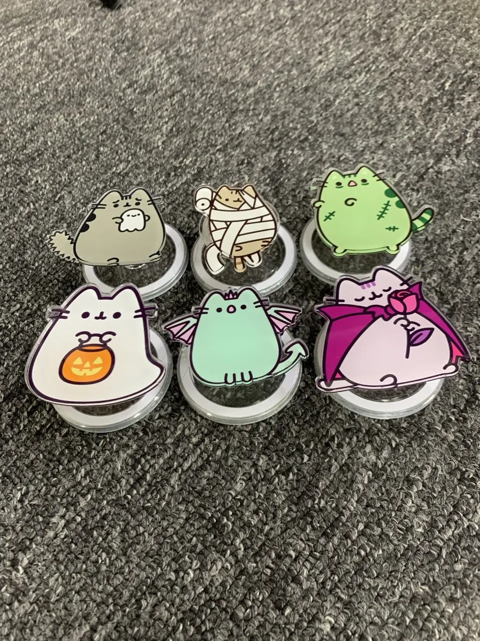 Spooky Cute Halloween Cat Acrylic Phone Grip, Kawaii Chubby Kitty Cell Phone Holder, Ghost Vampire Mummy Stand, Pastel Goth E-Reader Accessory