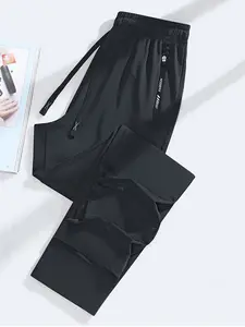 Men’s summer ice silk jogging pants, featuring a comfortable, soft fabric, pockets, and a drawstring—suitable for outdoor running and casual outings in summer.