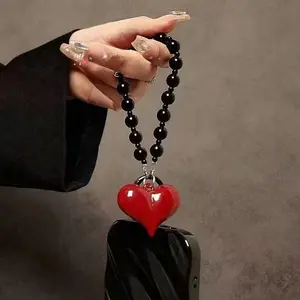 Personalized creative red heart-shaped beaded mobile chain with an "ins" style, sweet and cool vibe, heart-shaped pendant for ke