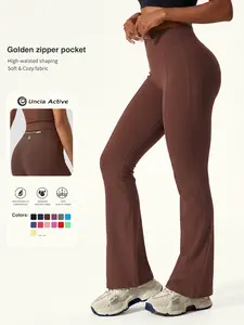 Uncia Active Women's 29.5 In High Waist Gold-Colored Zippered Pocket Flare Leggings - Elastane, Fitted Minimalist Bridal Basic Activewear for Yoga, Fitness, Summer Wins, Try it Womenswear Bottoms
