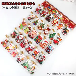 Christmas greeting card with beautiful Christmas wishes and small pendants, glitter gold powder message card