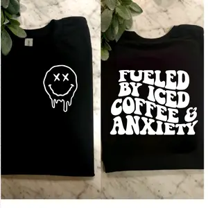 funny shirt fueled by iced coffee and anxiety humor sarcasm wavy lettering retro smiley short sleeve tshirt
