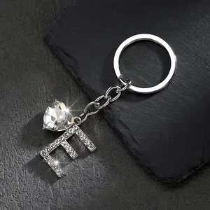 A Trendy New European And American Style Heart-Shaped English Letter Keychain Accessory Adorned with Sparkling Rhinestones And Crystals, Perfect for Adding a Luxurious Touch to Bags