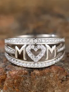 A ring with the word "Mom" engraved in relief and heart-shaped inlaid with crystals, making it an ideal jewelry gift for mom, Heart Cluster Ring. A great choice for giving as a gift on Mother's Day or on mom's birthday.