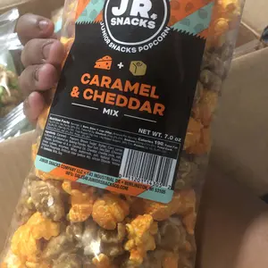 Junior Snacks Co. Caramel & Cheddar Popcorn Mix;  Crunchy Brown Sugar Salt Flavor combined with a Soft Cheddar bite