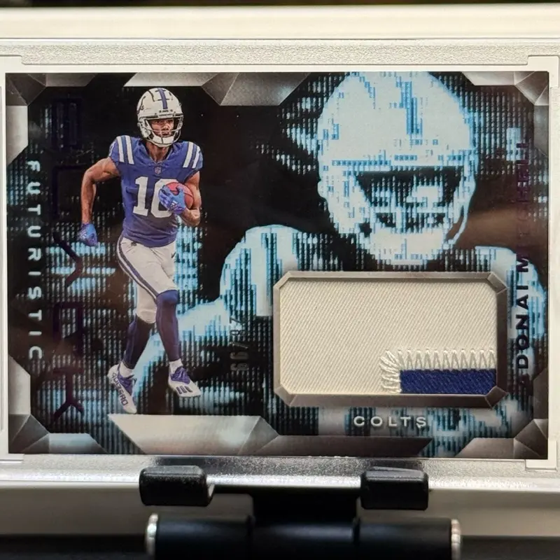 2024 Panini Black Futuristic Adonai Mitchell 2-Color Patch Trading Card, 28/99 Serial Numbered