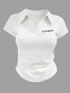 Women's short-sleeve slim-fit Polo shirt with London letter print, made of elastic fabric, featuring a lapel collar and a V-neck design. Suitable for work, daily wear, commuting, work uniforms, golf, vacation and campus. It boasts a minimalist