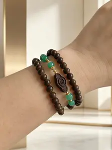 1 handmade double-layer wooden bead bracelet with pinecone and herbal calming fragrance, crafted using traditional recipes. Suitable for daily wear and gifting, unisex wooden aromatic accessory
