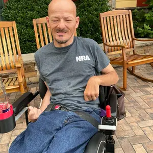 Cup holder for power wheelchair