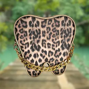 Tooth shaped mini backpack/purse Leopard and Gold