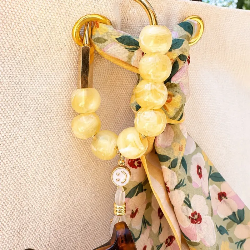 Smiley Bag Charm & Sunglass Holder