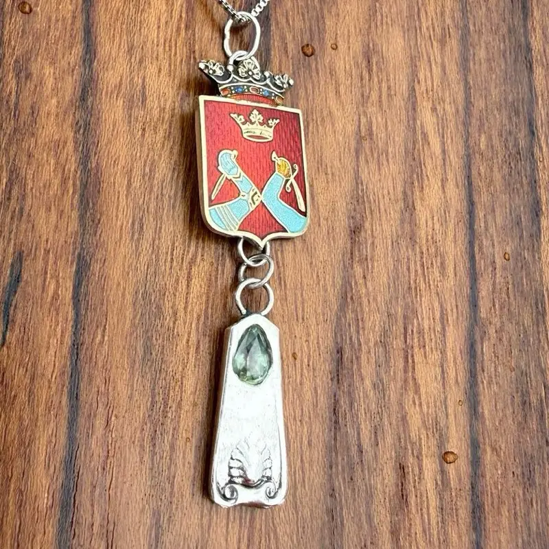 Blue green sapphire, and Sterling Silver pendant with coat of arms and enamel by famous Helsinki Silversmith.