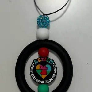 Car charm for rear view mirror