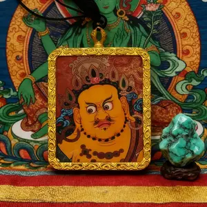 Yellow Jambhala Thangka Pendant Xizang Hand-Painted Amulet for Wealth & Abundance Traditional Tibetan Artwork with Golden Frame