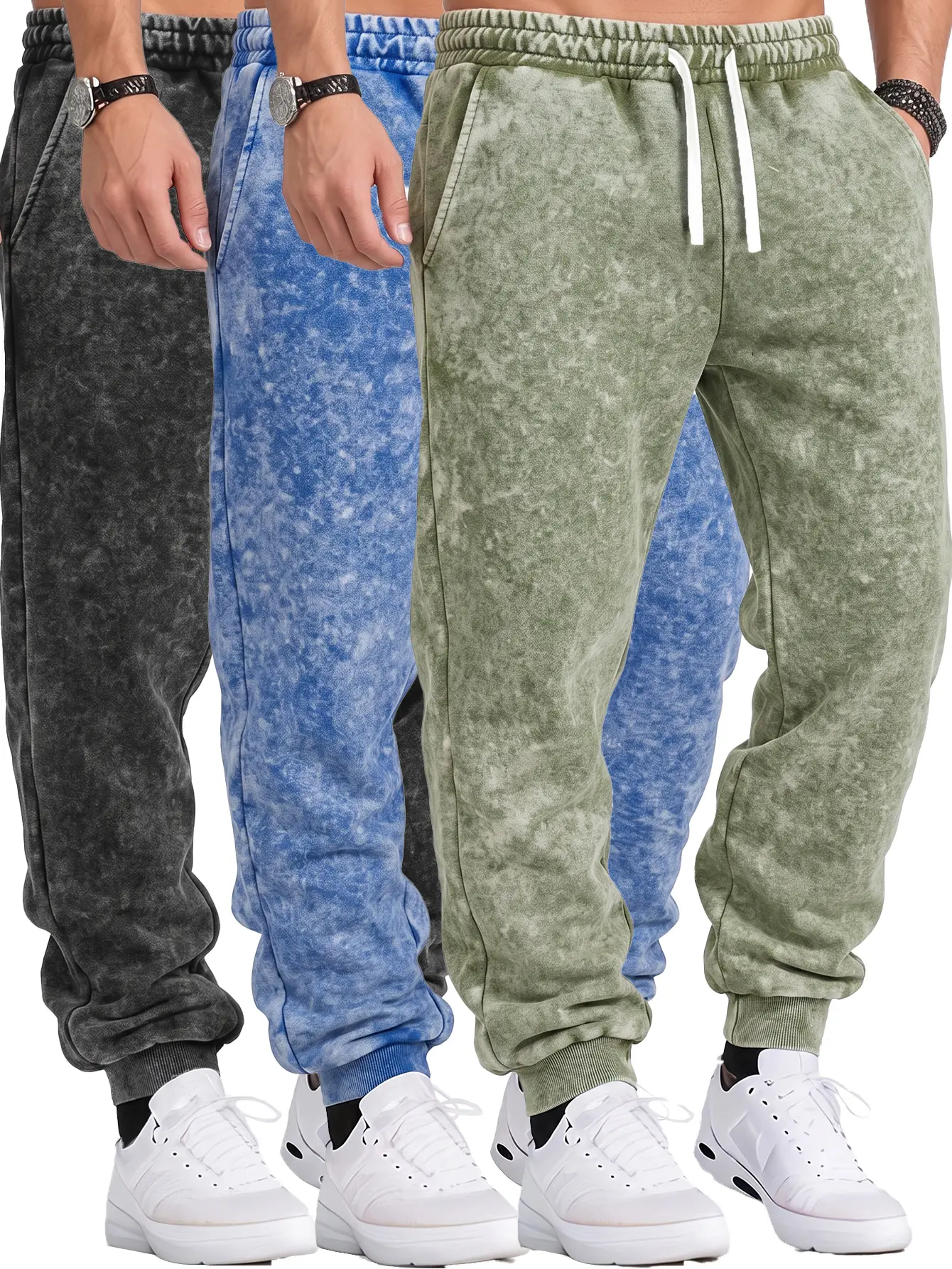 Acid-washed, distressed-look athletic sweatpants featuring a drawstring elastic waistband and side pockets; versatile, casual ribbed-cuff joggers suitable for both men and women