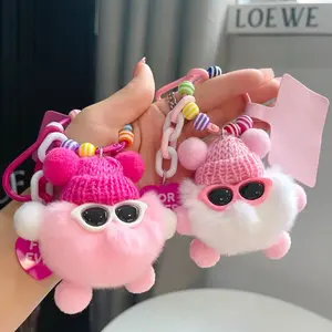 Cute coal ball car keychain pendant, women's exquisite plush doll book bag pendant, high-end bag pendant.