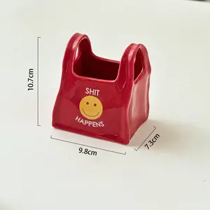 Personalized handbag-style desktop creative ceramic pen holder, remote control and stationery storage box, makeup pen storage bucket, small decorative item