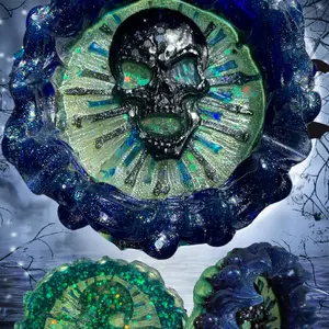 Handcrafted Skull Ashtray in Halloween Season with Glowing Green Eyes and Starry Sky Design