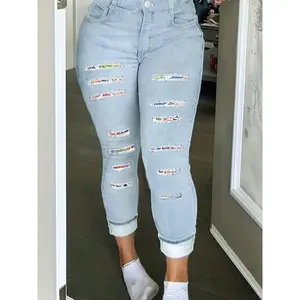 Plus Size Women's Jeans - Eye-Catching Graphic Patches & Distressed Rips, Button Fly, Ultra-Stretch Skinny Fit Denim - Curvy Chic