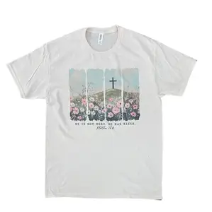 He Is Not Here He Has Risen Flower Field with Cross on Cream Tee