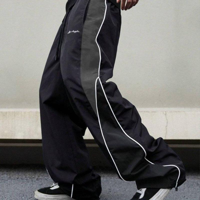 Men's Black Colorblock Sweatpants with White Side Stripes & Embroidered Design for Gym Wear, Loose Athletic Long Pants, Sporty Elegance, Drawstring Waist, Straight Leg Cut, Trendy Street Fashion Joggers Sports Menswear Embroidery Embroidery Tracksuit