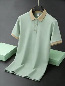 Men's Penguin Print Golf Polo, Short Sleeve, Ideal for Business Casual & Tennis Practice.  Green