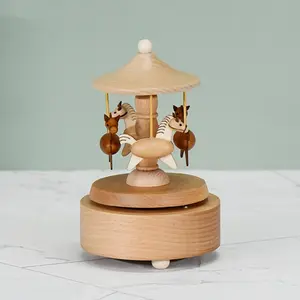 A Wooden-Colored Round Carousel Music Box That Operates Without Batteries, Featuring a Wind-Up Mechanism, Perfect As a Birthday Or Holiday Gift